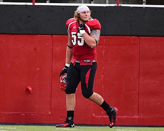 YOUNGSTOWN, OHIO - SEPTEMBER 6, 2014: Offensive linemen Trevor Strickland #55 of YSU walks to the locker room after being ejected from the game for throwing a punch during the 4th quarter of Saturday afternoon game at Stambaugh Stadium. YSU won 34-23. (Photo by David Dermer/Youngstown Vindicator)