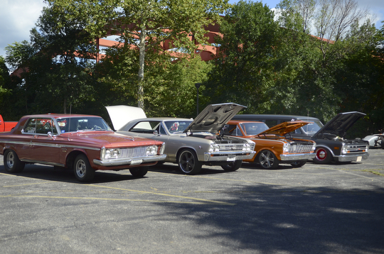 Katie Rickman | The Vindicator.Cars are lined up on display at the Rust Belt's second annual car show and artist market at the B&O Station in Youngstown September 7, 2014.