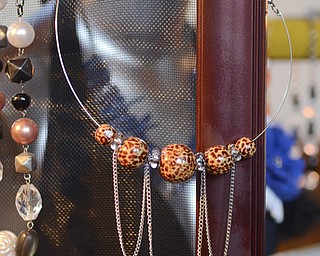 Katie Rickman | The Vindicator.Necklaces and earrings on display at Riversong Designs booth owned by Erica Perna of Niles Katie Rickman | The Vindicator.Necklaces and earrings on display at Riversong Designs booth owned by Erica Perna of Niles at the second annual Rust Belt car show and artist market at the B&O station September 7, 2014.