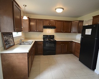 Katie Rickman | The Vindicator.The first Habitat for Humanity home for built retired veteran James Skok at 3889 New Road in Austintown will be dedicated Wednesday, Sept. 9, 2014.  Skok was wounded while in Iraq in 2003 and retired from the U.S. Marine Corps in 2010.