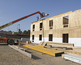        ROBERT K. YOSAY  | THE VINDICATOR..The city of Salem received more than $1.85 million from leasing rights on city property, said Mayor John Berlin. Salem used $650,000 to pay down debt from the cities efforts to revitalize the downtown and improve roads for economic development..The hotel will be the only one in Salem and represents just a part of the economic development in the city....  -30-       ROBERT K. YOSAY  | THE VINDICATOR...  -30-