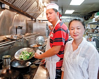 Guosheng Dong and Chen Jiang are the owners of China Star, 3415 Canfield Road. The Chinese restaurant’s
business is suffering from recent coverage of a food-delivery truck that had spoiled food and which made stops at some Mahoning Valley restaurants. China Star was not on the delivery list.