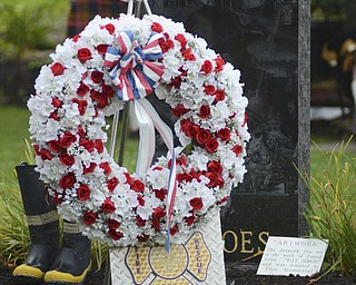 Katie Rickman | The Vindicator.A memorial in remembrance of fire fighters who lost their lives when responding to the attacks on Sept. 11, 2001 on display during the anniversary ceremony in Austintown Sept. 11, 2014.