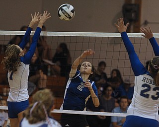 Lakeview's Anne Pavlansky (2) spikes the ball between the block set up by Hubbard's Macey Sarisky (7) and Annie Zagorec (23) during Thursday evenings matchup at Lakeview High School in Cortland.  Dustin Livesay  |  The Vindicator 09/11/14  Lakeview High School.