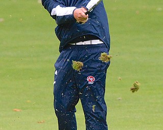 Jeff Lange | The Vindicator  Anthony Catauro sophomore at Fitch approaches the green from the 11th fairway with an iron, Thursday afternoon at Deer Creek Golf Course.