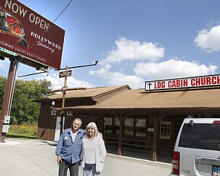        ROBERT K. YOSAY  | THE VINDICATOR..   Terry and Nancy Snyder at the LOG CABIN CHURCH next to the ...Opening DAY  at the Austintown Hollywood Gaming as Ray 'BOOM-BOOM' Mancini was the high light of the ribbon cutting... -30-
