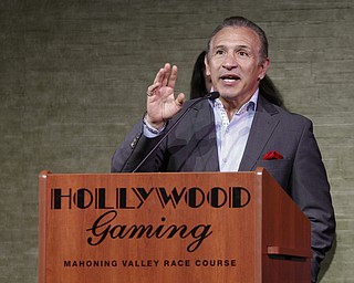        ROBERT K. YOSAY  | THE VINDICATOR..   RAY BOOM BOOM MANCINI  talks to the crowd and hopes to someday have boxing at the facility ...Opening DAY  at the Austintown Hollywood Gaming as Ray 'BOOM-BOOM' Mancini was the high light of the ribbon cutting... -30-