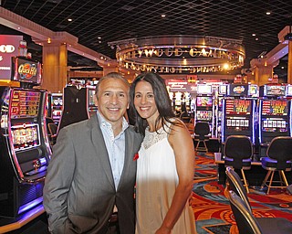        ROBERT K. YOSAY  | THE VINDICATOR..  Ray Mancini and his wife Tina... .. Opening DAY  at the Austintown Hollywood Gaming as Ray 'BOOM-BOOM' Mancini was the high light of the ribbon cutting... -30-