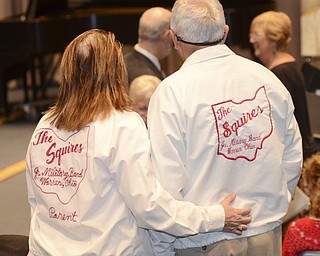 Katie Rickman | The Vindicator.Judi Gensburg (left) and her husband Bart pose for a photo showing their Jr. Military Band jackets that they wore when their three children were a part of the band.  The Gensburg's attended the scholarship announcement ceremony at Bliss Hall Friday, Sept. 19, 2014.
