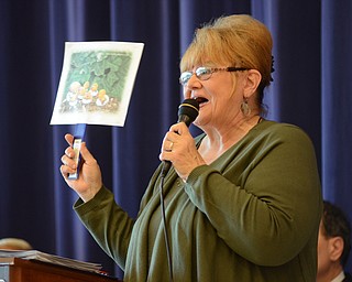 Katie Rickman | The Vindicator Shirley Eckley, vice president of The William Holmes McGuffey Historical Society, reads ÒThe Ugly DucklingÓ  during the FounderÕs Day and Pioneer Award Celebration at William Holmes McGuffey Elementary School on Friday, Sept. 19, 2014 in Youngstown.