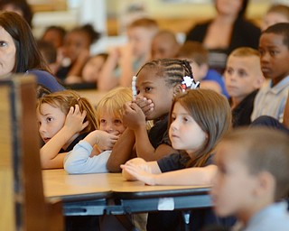 Katie Rickman | The Vindicator .Students at William Holmes McGuffey Elementary School listen to Youngstown Artist Al Bright speak at the Founder’s Day Program at the elementary school on Friday, Sept. 19, 2014 in Youngstown.