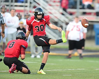 CANFIELD, OHIO - SEPTEMBER 19, 2014: Kicker Bryan Kristan #30 of Canfield kicks a field goal from the hold of Matt Milligan during the 1st half of Friday nights OHSAA football game at Canfield High School. (Photo by David Dermer/Youngstown Vindicator) This would make the score 3-0 Canfield.
