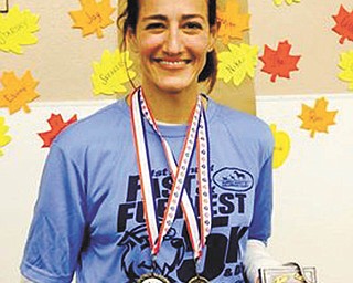 SPECIAL TO THE VINDICATOR: Heather Bishop plans to run the Akron Marathon for the benefit of the Humane Society of Columbiana County.