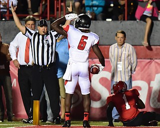 YOUNGSTOWN, OHIO - SEPTEMBER 20, 2014: Receiver Terell Smith #6 of Saint Francis salutes the fans after scoring a touchdown over defensive back Julius Childs #1 of YSU during the 1st half of Saturday nights game NCAA football at Stambaugh Stadium. (Photo by David Dermer/Youngstown Vindicator) He would be flagged for taunting.