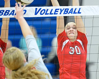 Jeff Lange | The Vindicator  Perry's Emily Holroyd prepares to block the shot of a South player during their matchup at Hubbard High School, Saturday morning.