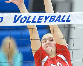 Jeff Lange | The Vindicator  Emily Holroyd of Perry lets a ball slip past her fingers as she attempts to block a South shot during the Pirates' match against South at Hubbard High School, Saturday morning.