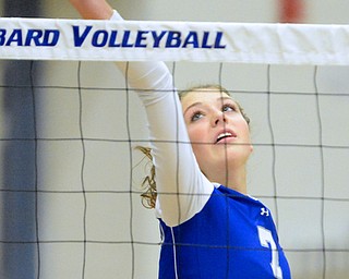 Jeff Lange | The Vindicator  Hubbard's Macey Sarisky puts the ball over the net during Saturday volleyball games at Hubbard High School.