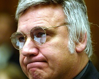 Rep. James Traficant, D-Ohio, arrives on Capitol Hill Monday, July 15, 2002, before the House Ethics Committee. In an uphill fight to keep from becoming only the second House member expelled from Congress since the Civil War, Traficant opened his second defense this week against official misconduct.  He was convicted in court of bribery, tax evasion and racketeering charges. (AP Photo/Ron Edmonds)