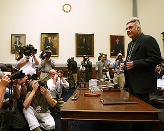 Rep. James Traficant, D-Ohio, arrives on Capitol Hill in Washington, Monday, July 15, 2002, to testify before the House Ethics Committee. In an uphill fight to keep from becoming only the second House member expelled from Congress since the Civil War, Traficant opens his second defense this week against the bribery, tax evasion and racketeering charges he was convicted of in court. (AP Photo/Ron Edmonds)