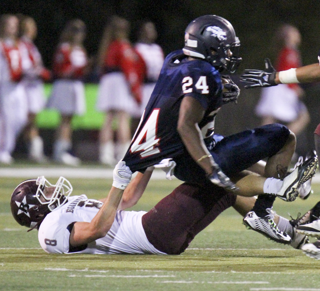 William D Lewis The vindicator  Fitch'sDarrin Hall(24) is brought down by Boardman's Alex Duda(8) during 9-26 action at Fitch.
