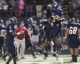 William D Lewis the vindicator Fitch's Mike Pearson(3) reacts after recovering a fumble duuring 1rst half of game with Boardman. With him is Dwayne howell(21).