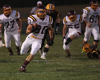 South Range's Joe Alessi (30) outuns Crestview defenders for a big game during the first quarter of Friday nights matchup at Crestview High School in Columbiana.   Dustin Livesay  |  The Vindicator  09/26/14  Crestview High School.
