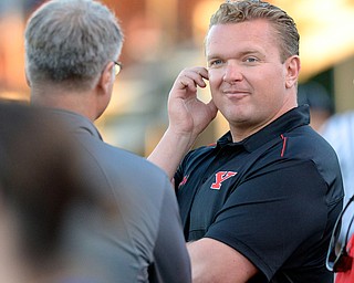 Jeff Lange | The Vindicator  YSU's head football coach Eric Wolford made an appearance on the sidelines of last night's game in Poland against the opposing Hubbard Eagles.