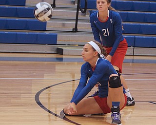 Western Reserve's Rachel Maslach (5) returns a serve during Saturday morning's matchup against Crestview at Western Reserve High School in Berlin Center.