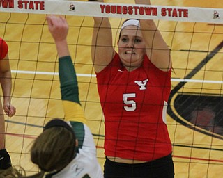 Youngstown State's Shannon Watson (5) blocks a shot taken by Wright State's Haley Garr (3) during Saturday afternoons matchup at the Beeghly Center.  Dustin Livesay  |  The Vindicator  09/27/14  Beeghly Center.