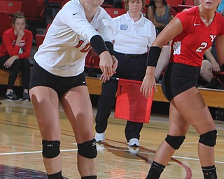 Youngstown State's Nikki Thompson (10) returns a serve during Saturday afternoons matchup against Wright State at the Beeghly Center.
