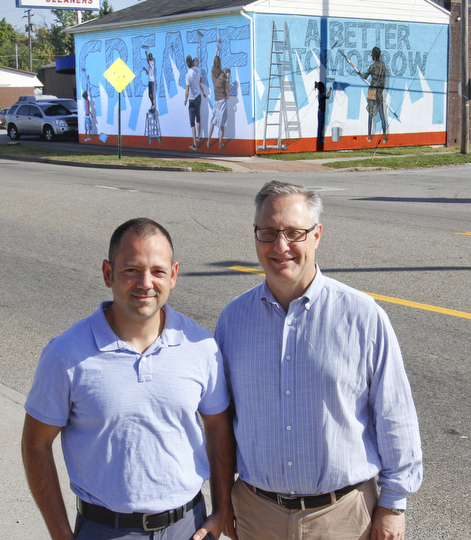        ROBERT K. YOSAY  | THE VINDICATOR..Two New Murals were shown today with the artists..  The area of Glenwood and Parkview where both buildings ( the former Park Inn and the LaFrance Building..part of YNDC - the Park Inn with Tommy Morgan formerly of Boardman - "face the future" and  La France with Jeremy Jarvis and the owner o fLaFrance Stephen Weiss...-30-