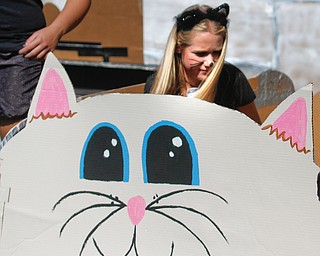        ROBERT K. YOSAY  | THE VINDICATOR..reinforceing the  "Kittens for Sail" is  Kaitlin Francis .. sophmore..The Annual Raider  Regatta done annually by 10th grade students at Memorial Park behind the old high School ...-30-