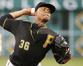 Pittsburgh Pirates’ Edinson Volquez warms up before the first inning of a game against the Milwaukee Brewers in Pittsburgh. Volquez will get the start when the Pirates face the San Francisco Giants in the National League Wild Card game Wednesday.