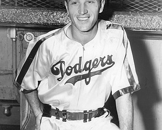 Youngstown native George “Shotgun” Shuba is shown during his playing career with the Brooklyn Dodgers.
Shuba, who died Monday at 89, is known for a memorable handshake with Jackie Robinson after Robinson hit a home run for the Dodgers’ Montreal farm team.