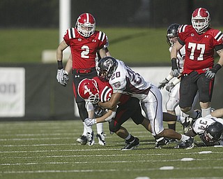 Missouri State safety Mike Crutcher (20) tackles YSU running back Jamaine Cook as teammate Christian Bryan (2) looks on. A week after defeating eventual national champion North Dakota State, Youngstown State lost its 2011 finale to the Bears, falling out of the playoff hunt.