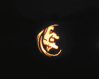 10. This gourd was submitted by Marian Greenawalt of Warren who carved the witch in 2010.