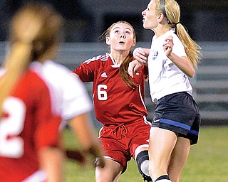 Niles’ Kaylee Scarnatti (6) tries to head the ball away from Lakeview’s Sam Yanci during their game Wednesday in Cortland. The teams played to a 1-1 draw, but Niles went home with the AAC White Tier title.