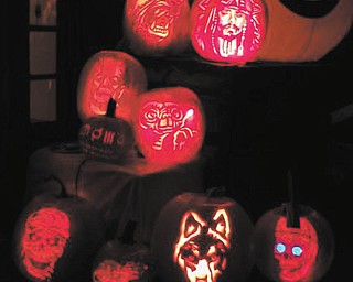 18. These pumpkins were carved by Jennifer Downie of Poland in 2011.