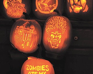19. Jennifer Downie carved these pumpkins in 2012.