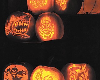 20. These jack-o'-lanterns were carved by Jennifer Downie in 2013.
