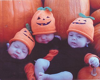 23.  Twins Anelise and Ruby Garza, with their cousin, Giana Dailey, all of Houston. They were born three days apart. Submitted by Aunt Palma Vertucci of Youngstown.
