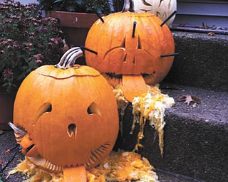 4. The puking pumpkins were submitted by Janet Misel and Christopher Kalis of Youngstown. This is a small sample of the haunted decorations they put up every year.
