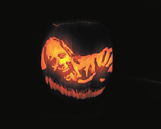 7. Here's a Zombie from The Walking Dead carved by Jamie Williams of Austintown.