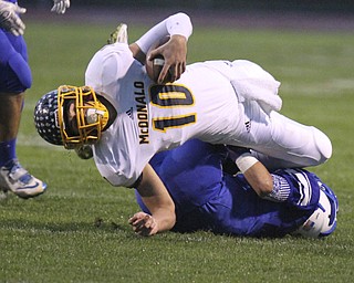 William D Lewis the vindicator  McDonald's Cameron Ifft(10)  is upended during 1rst half action 10-3-14 at WR.