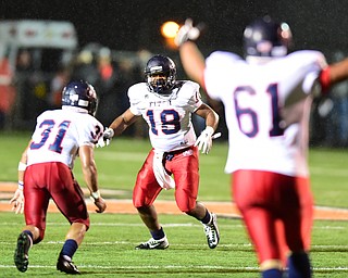 MASSILLON, OHIO - OCTOBER 3, 2014: Antwan Harris #18 and Tyler Hewlett #31 celebrate after a 23 yard touchdown pass by Harris during the 1st half of Friday nights OHSAA football game at Massillon Washington High School. (Photo by David Dermer/Youngstown Vindicator) Fitch Gary Cole #61 pictured.