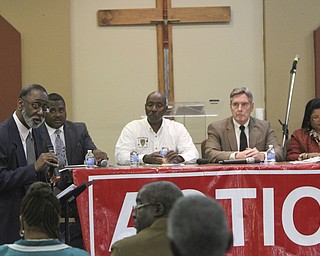 William D. Lewis The Vindicator Ernie Brown of The Vindicator , left, moderates  a seminar 9-30-14 at Metro Asembly Church in Youngstown about what to do if stopped by police. Panelists from left are Guy Burney- EXEC DIR of CIRV, Jimmy Hughes- former YPD Chief, Robin Lees-YPD Chief and Delpine Baldwin Casey retired YPD.