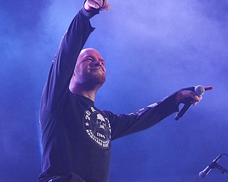 Katie Rickman | The Vindicator.Ivan Moody, the lead singer of Five Finger Death Punch points at the crowd as they sing along to a song during the concert at the Covelli Centre Saturday, Oct. 4, 2014.