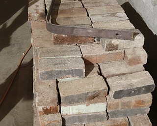        ROBERT K. YOSAY  | THE VINDICATOR..brick from the old building are stored and hope to be reused....-30-