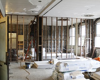        ROBERT K. YOSAY  | THE VINDICATOR..Rich Giardina  works on a wall in the upper floor that will be made into offices.....Warrens' TECH belt energy innovation center on  courthouse square, right  next door to the Wean Foundation offices..the old Kresge'  business.-30-