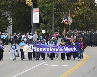 Katie Rickman | The Vindicator.Sojourn to the Past walks down Wick Ave. leading the parade for the 5th Annual Nonviolence Parade on Sunday, Oct. 5, 2014. A rally followed the parade which traveled from Wood St. in Youngstown, down Wick Ave. and ended at the Covelli Centre.
